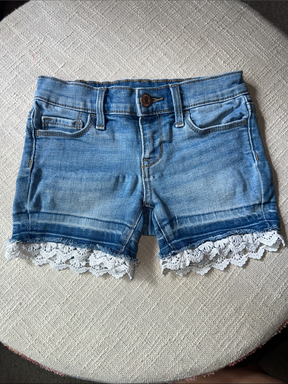 Girls Old Navy Light Blue Denim Shorts with White Lace Hem. Size 6.